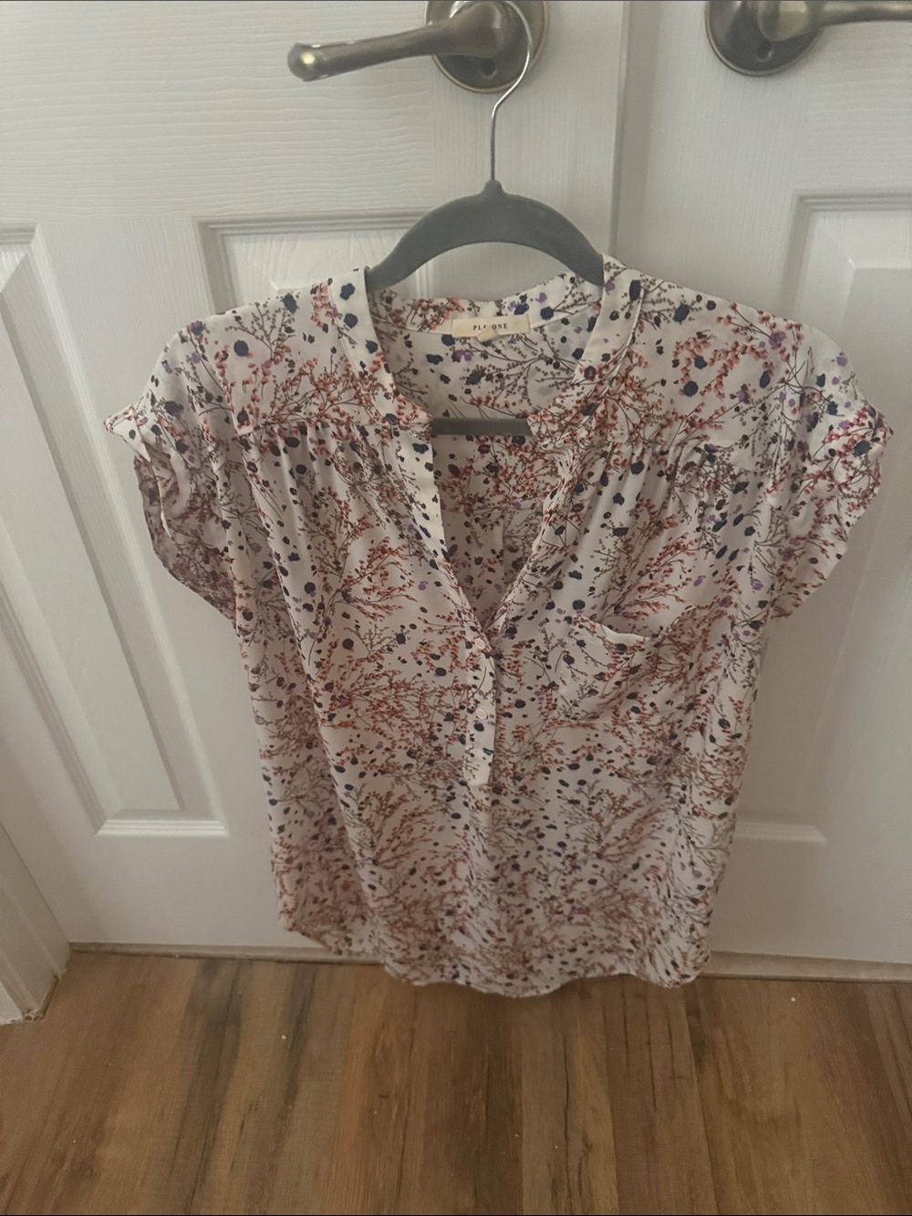 Pleione White Floral Short-Sleeve Split-Neck Blouse with Rust and Navy Accents